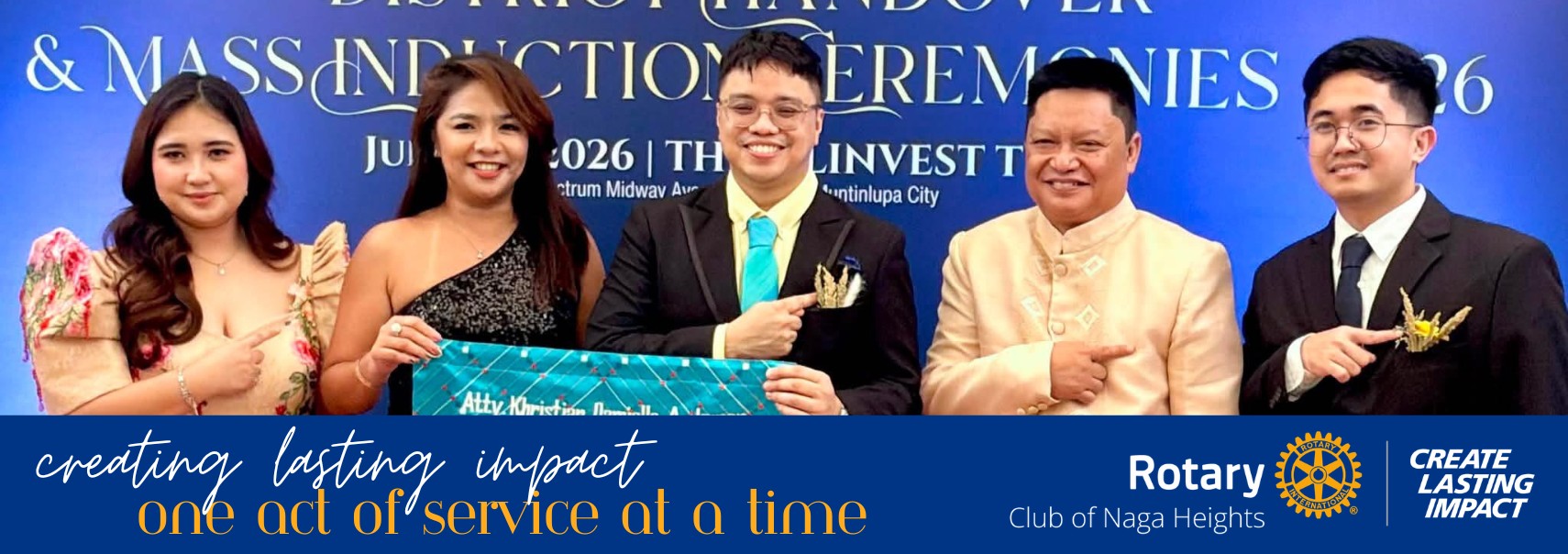 Rotary Club of Naga Heights members at the District Handover and Mass Induction Ceremonies, with the club's Create Lasting Impact theme banner.
